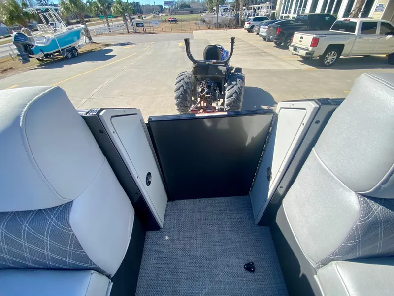 Slide: The Image of Interior view of 2023 Vanderbilt 700T boat with tractor in background. - 25
