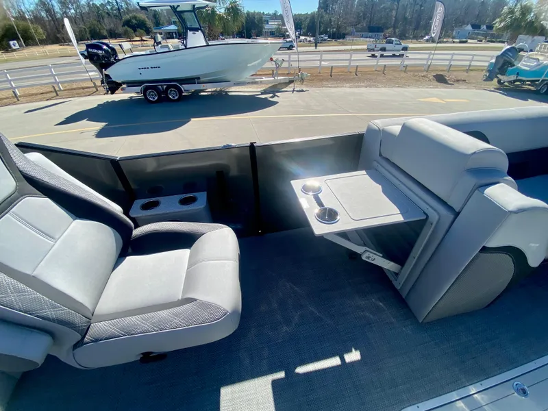 Slide: The Image of Interior of 2023 Vanderbilt 700T boat with seating and table setup. - 19