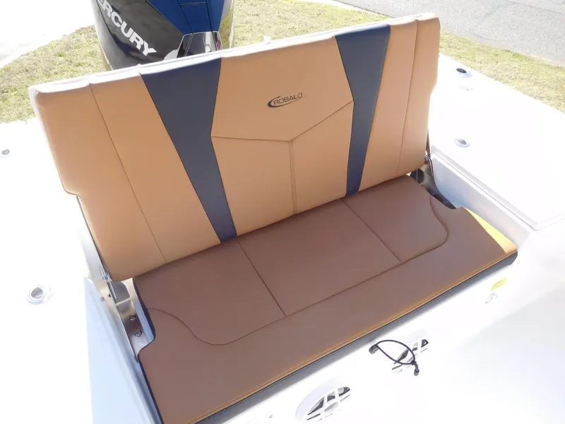Slide: The Image of 2024 Robalo 226 Cayman boat seat with tan and black upholstery. - 14