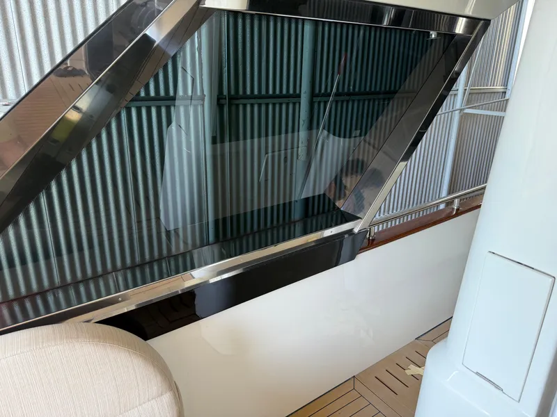 Slide: The Image of 2012 Monte Carlo Yachts 76 interior with sleek window design and modern finishes. - 44