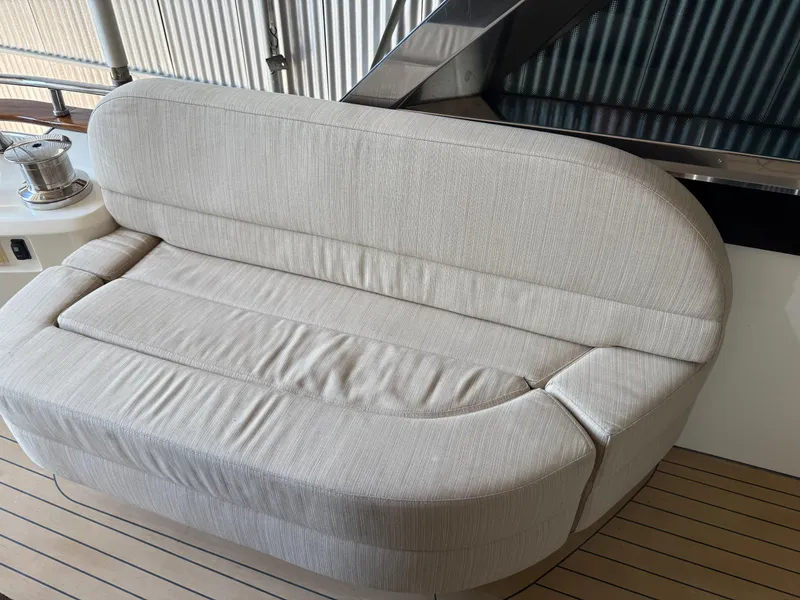Slide: The Image of Beige cushioned seating on 2012 Monte Carlo Yachts 76 deck. - 45