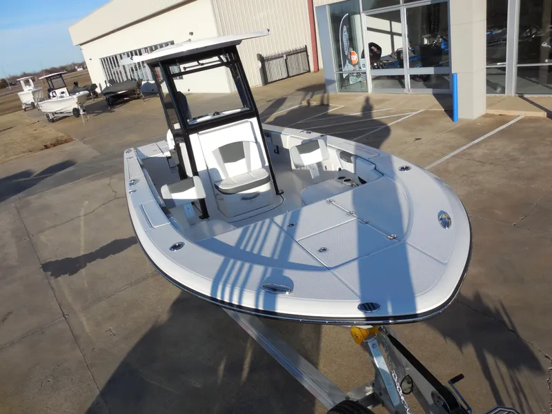 Slide: The Image of 2024 Robalo R266 Cayman boat on trailer at dealership. - 4