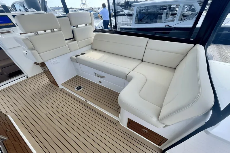 Slide: The Image of Luxurious seating area on 2024 MJM 4 yacht with elegant wood flooring. - 10