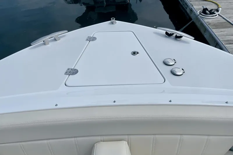 Slide: The Image of 2024 MJM 4 boat bow with sleek white deck and fittings. - 30