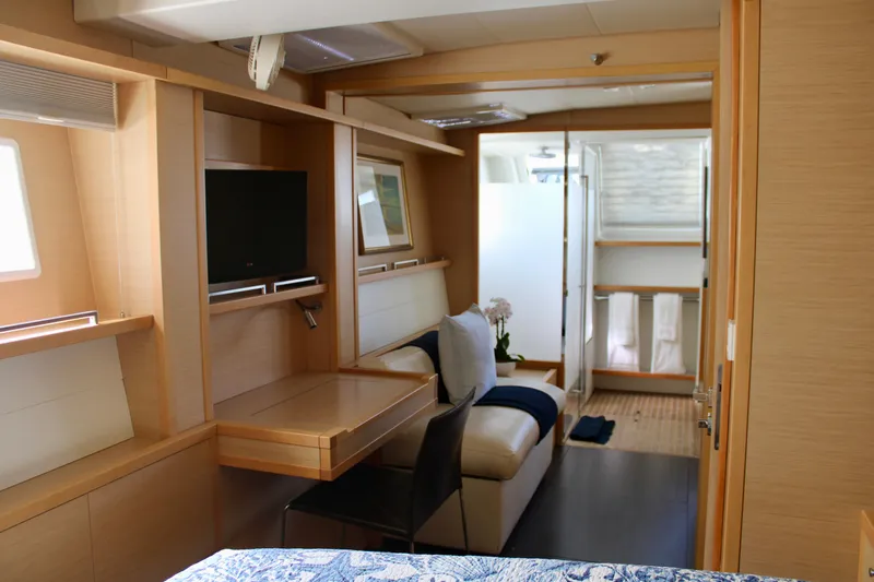 Slide: The Image of Interior of 2015 Lagoon 620 yacht with modern furnishings and natural light. - 17