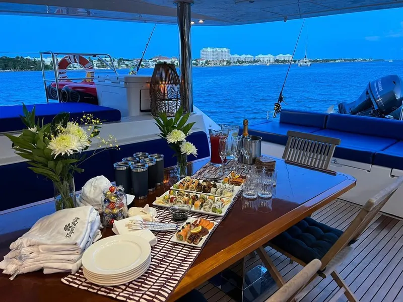 Slide: The Image of Luxury dining setup on Lagoon 620 yacht, 2015 model, with ocean view. - 3