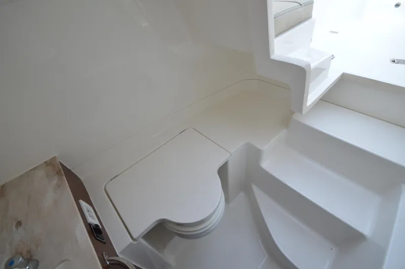 Slide: The Image of Interior view of 2019 Pursuit S 288 Sport boat showing seating and steps. - 24