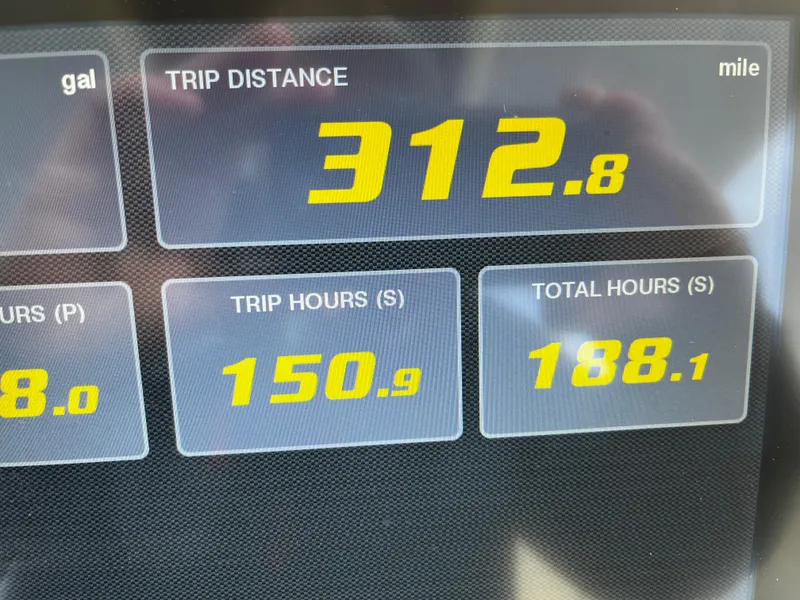 Slide: The Image of Digital display showing trip distance, trip hours, and total hours on a 2019 Pursuit S 288 Sport. - 40