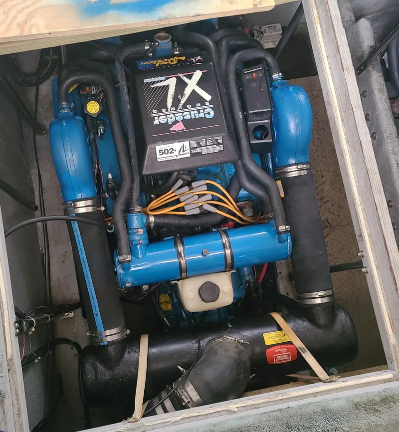 Slide: The Image of Engine compartment of a 1997 Silverton 372 Motor Yacht with Crusader 7.4L engine. - 21