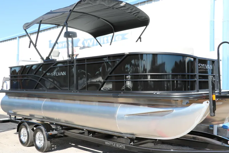 The Image of 2024 Sylvan Mirage 8522 Party Fish pontoon boat on trailer. - 0