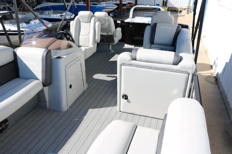 Slide: The Image of 2024 Sylvan Mirage 8522 Party Fish pontoon boat interior with luxurious seating. - 13