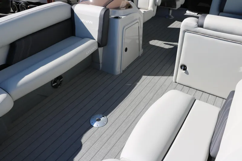 Slide: The Image of 2024 Sylvan Mirage 8522 Party Fish boat interior with spacious seating and modern design. - 15