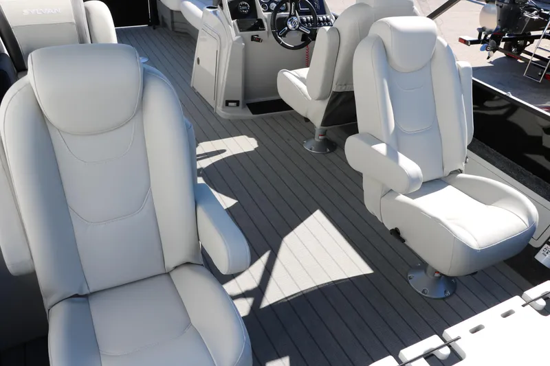 Slide: The Image of 2024 Sylvan Mirage 8522 Party Fish boat interior with luxurious seating. - 19