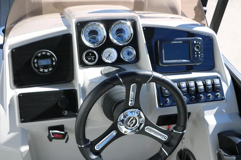 Slide: The Image of Dashboard of 2024 Sylvan Mirage 8522 Party Fish boat with steering wheel and gauges. - 30