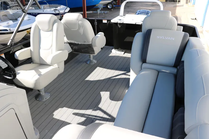 Slide: The Image of 2024 Sylvan Mirage 8522 Party Fish interior with luxurious seating and modern design. - 36
