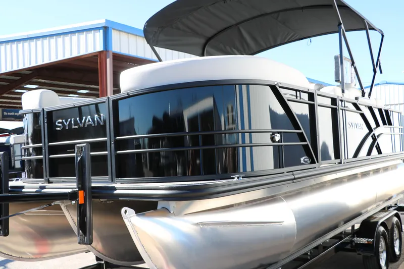 Slide: The Image of 2024 Sylvan Mirage 8522 Party Fish pontoon boat in a showroom. - 7