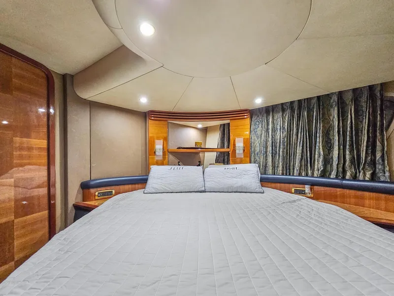 Slide: The Image of Luxurious bedroom interior of 2005 Azimut 55 Flybridge yacht with modern lighting. - 25