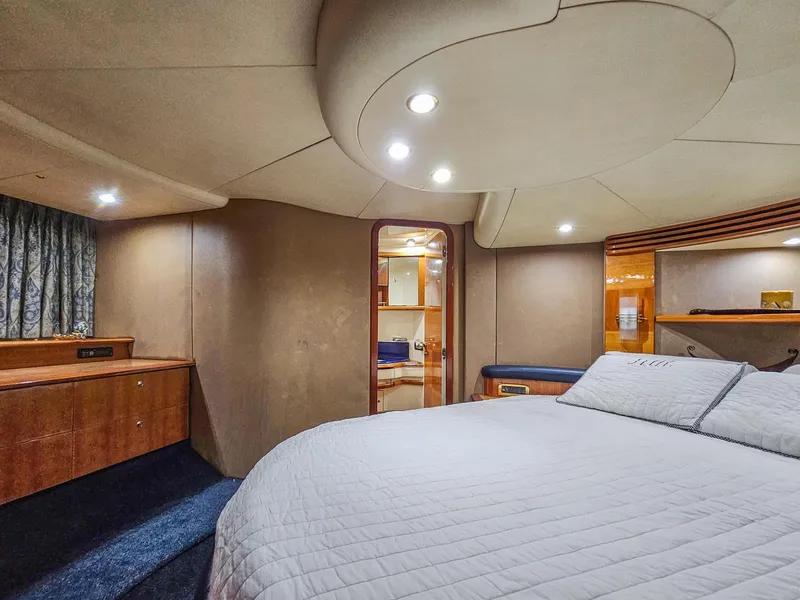 Slide: The Image of Luxurious bedroom interior of 2005 Azimut 55 Flybridge yacht with modern lighting. - 27