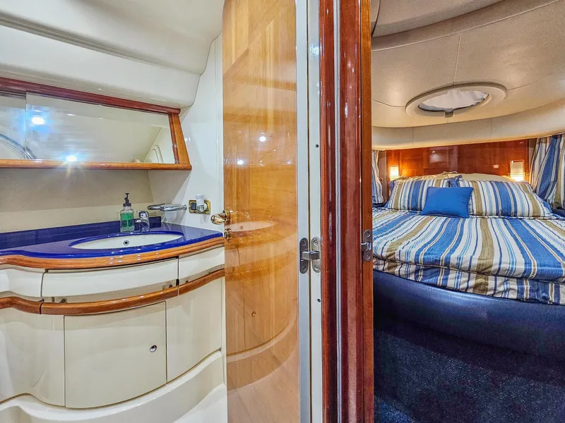 Slide: The Image of Luxury cabin interior of 2005 Azimut 55 Flybridge yacht with ensuite bathroom. - 31