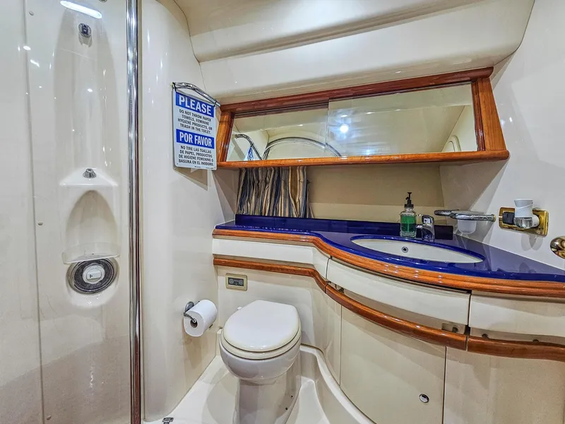 Slide: The Image of Luxurious bathroom on a 2005 Azimut 55 Flybridge yacht with modern amenities. - 32