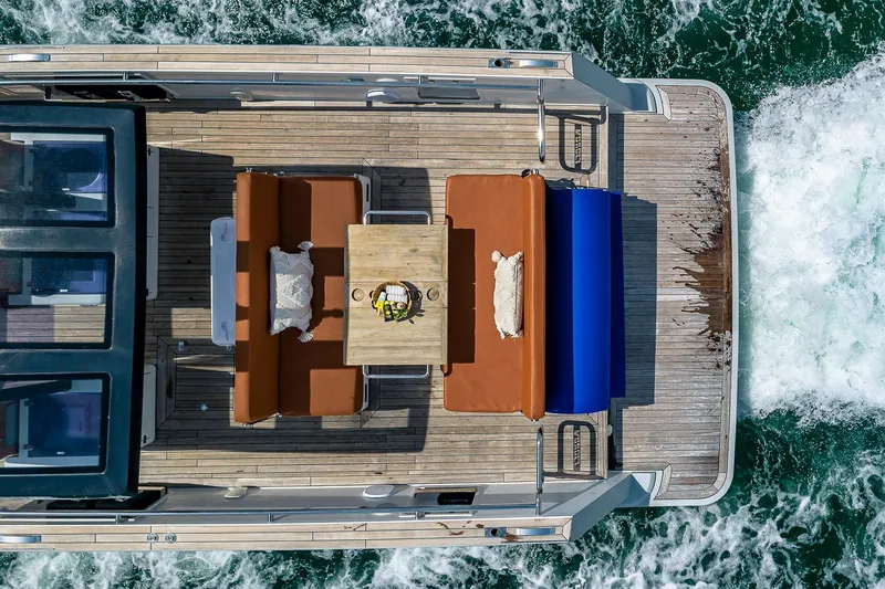 Slide: The Image of Aerial view of 2017 Fjord 40 Open yacht with deck seating and table. - 13