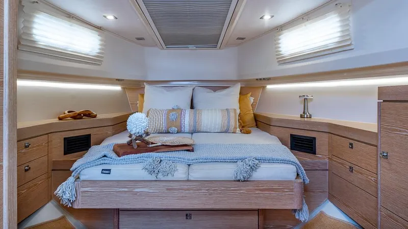 Slide: The Image of Luxurious cabin interior of 2017 Fjord 40 Open yacht with cozy bedding and elegant decor. - 15