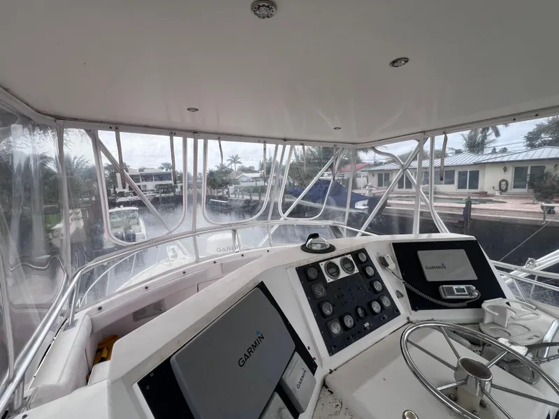 Slide: The Image of Interior view of 1988 Bertram 43 Convertible yacht cockpit with navigation equipment. - 26