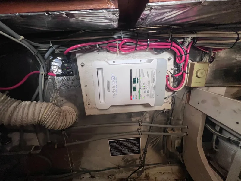 Slide: The Image of Electrical panel in the engine room of a 1988 Bertram 43 Convertible boat. - 38