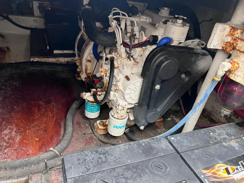 Slide: The Image of Engine compartment of a 1988 Bertram 43 Convertible boat. - 40