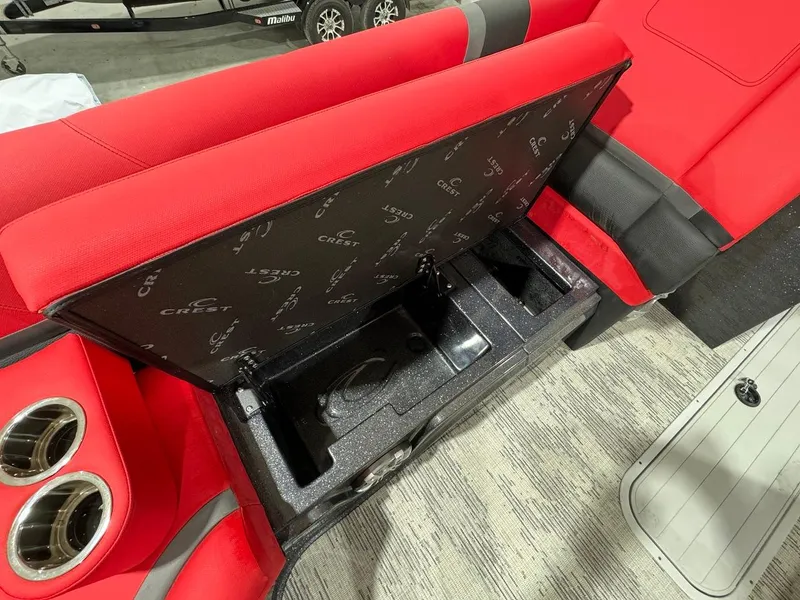 Slide: The Image of 2024 Crest Caribbean RS 230 SLRC with Mercury outboard motor in showroom. - 20