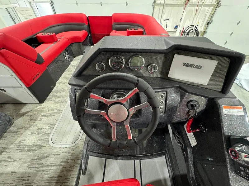 Slide: The Image of 2024 Crest Caribbean RS 230 SLRC boat interior with red seating and modern design. - 22