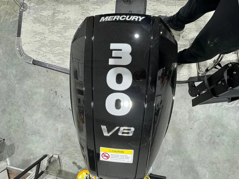 Slide: The Image of 2024 Crest Caribbean RS 230 SLRC boat interior with red and black seating. - 28