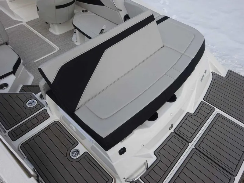 Slide: The Image of 2023 Sea Ray SPX 210 boat with spacious seating and modern deck design. - 22