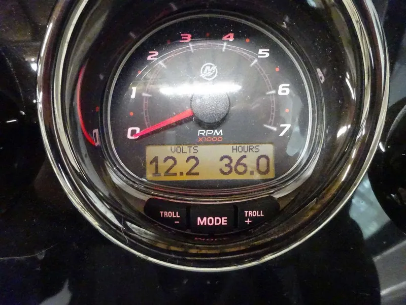 Slide: The Image of Sea Ray SPX 210 2023 boat tachometer showing 12.2 volts and 36.0 hours. - 25