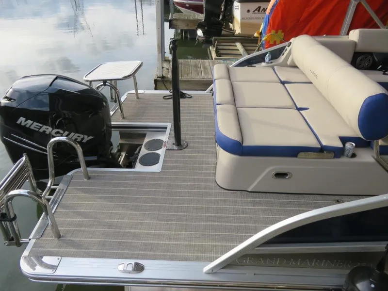 Slide: The Image of 2022 Harris Grand Mariner 250 pontoon boat with Mercury outboard engine. - 11