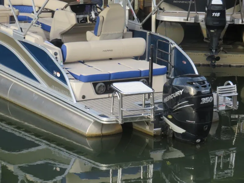 Slide: The Image of 2022 Harris Grand Mariner 250 pontoon boat with Mercury 350 outboard engine. - 12