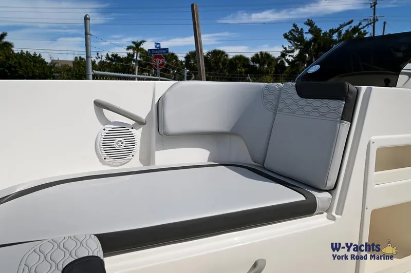 Slide: The Image of 2024 Bayliner M19 boat interior seating with speaker, W-Yachts York Road Marine. - 4