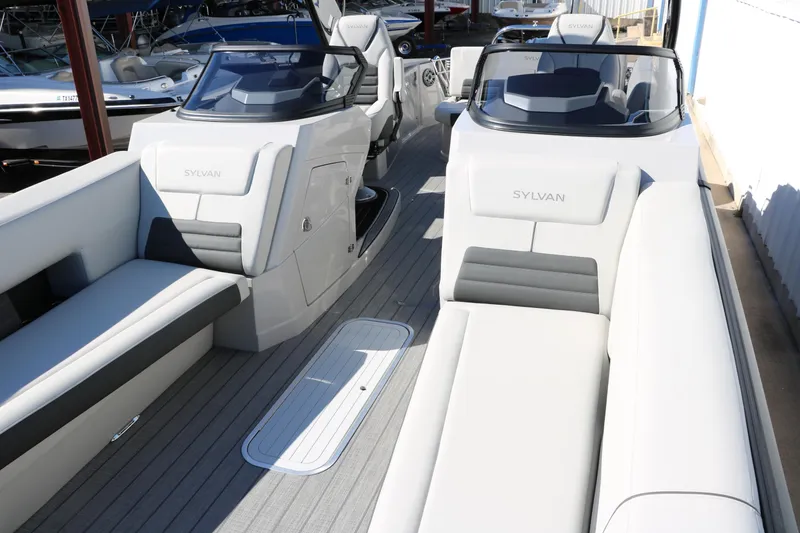 Slide: The Image of 2024 Sylvan G5 CLZ DC boat interior with luxurious seating and modern design. - 24
