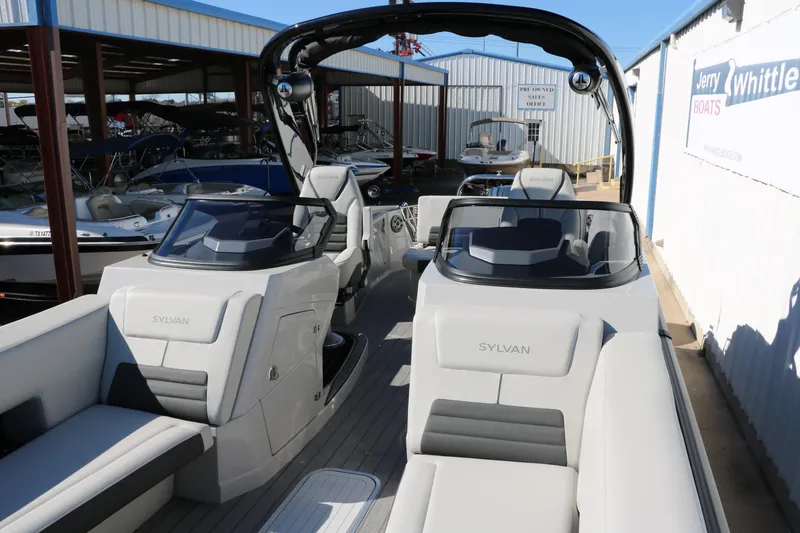Slide: The Image of 2024 Sylvan G5 CLZ DC boat interior at a dealership. - 25