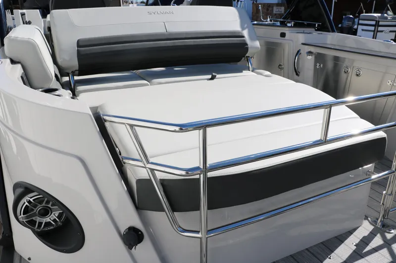 Slide: The Image of 2024 Sylvan G5 CLZ DC boat with cushioned seating and stainless steel railings. - 30