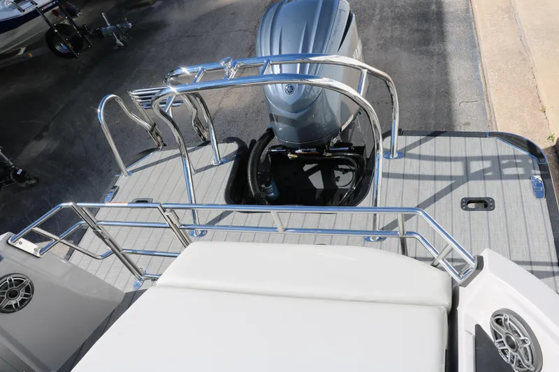 Slide: The Image of 2024 Sylvan G5 CLZ DC boat stern with outboard motor and stainless steel railings. - 31