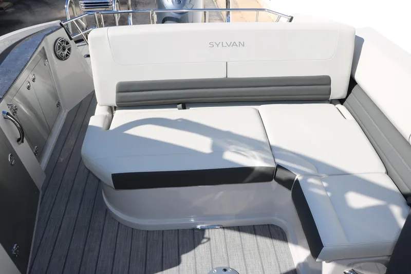 Slide: The Image of 2024 Sylvan G5 CLZ DC boat interior with cushioned seating and modern design. - 42