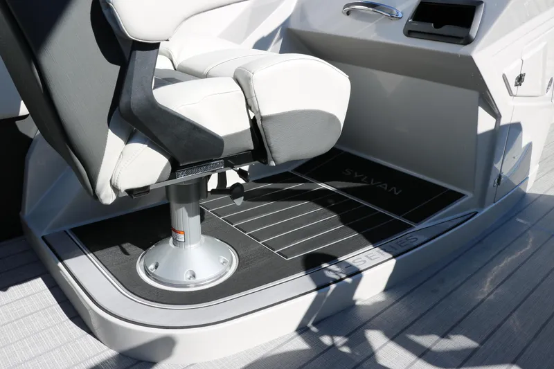 Slide: The Image of 2024 Sylvan G5 CLZ DC boat captain's chair and console area. - 44