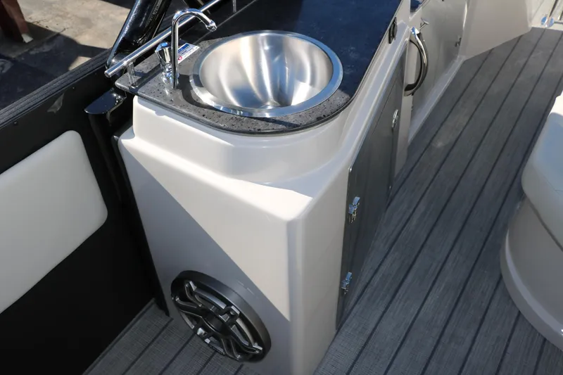 Slide: The Image of 2024 Sylvan G5 CLZ DC boat interior with sink and speaker. - 46