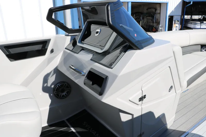 Slide: The Image of 2024 Sylvan G5 CLZ DC boat dashboard with modern controls and sleek design. - 47