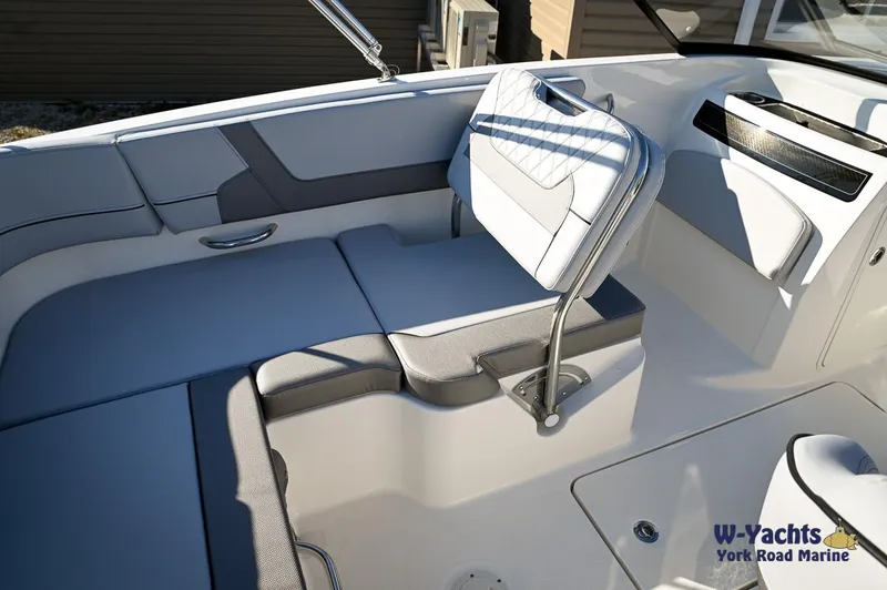 Slide: The Image of 2024 Bayliner VR5 boat interior with seating and storage compartments. - 19