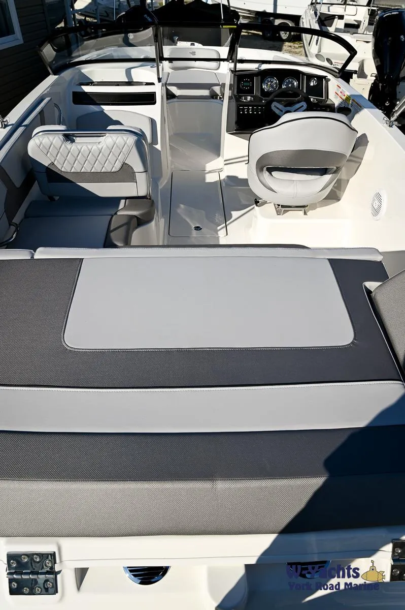 Slide: The Image of 2024 Bayliner VR5 boat interior with seating and dashboard. - 20