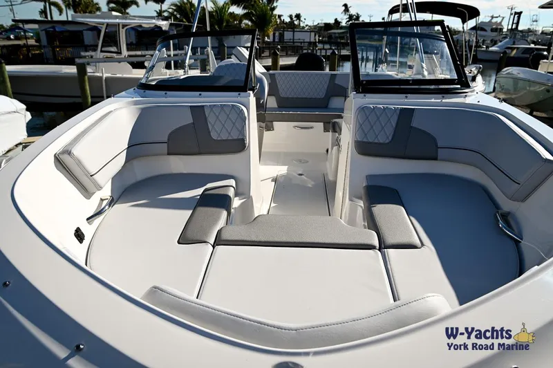 Slide: The Image of 2024 Bayliner VR5 boat interior with spacious seating and modern design. - 25