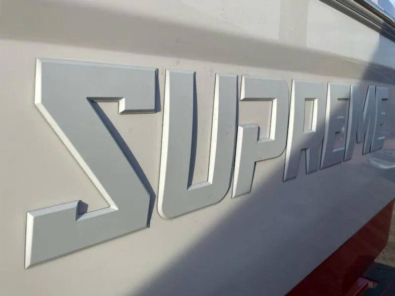 Slide: The Image of Supreme S240 2024 model logo on boat exterior. - 11