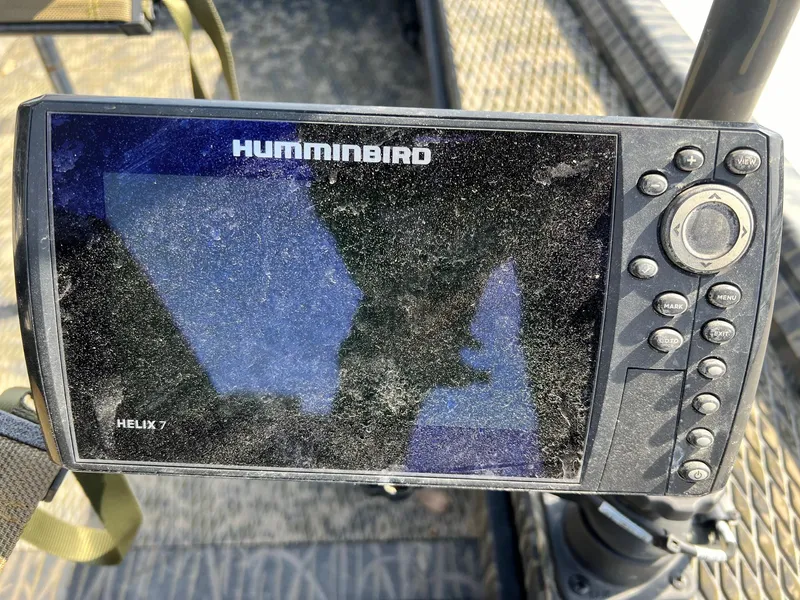 Slide: The Image of Humminbird Helix 7 fish finder on a 2022 Prodigy 1751 boat. - 6